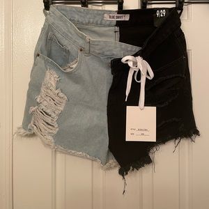 Half black half jean colored shorts